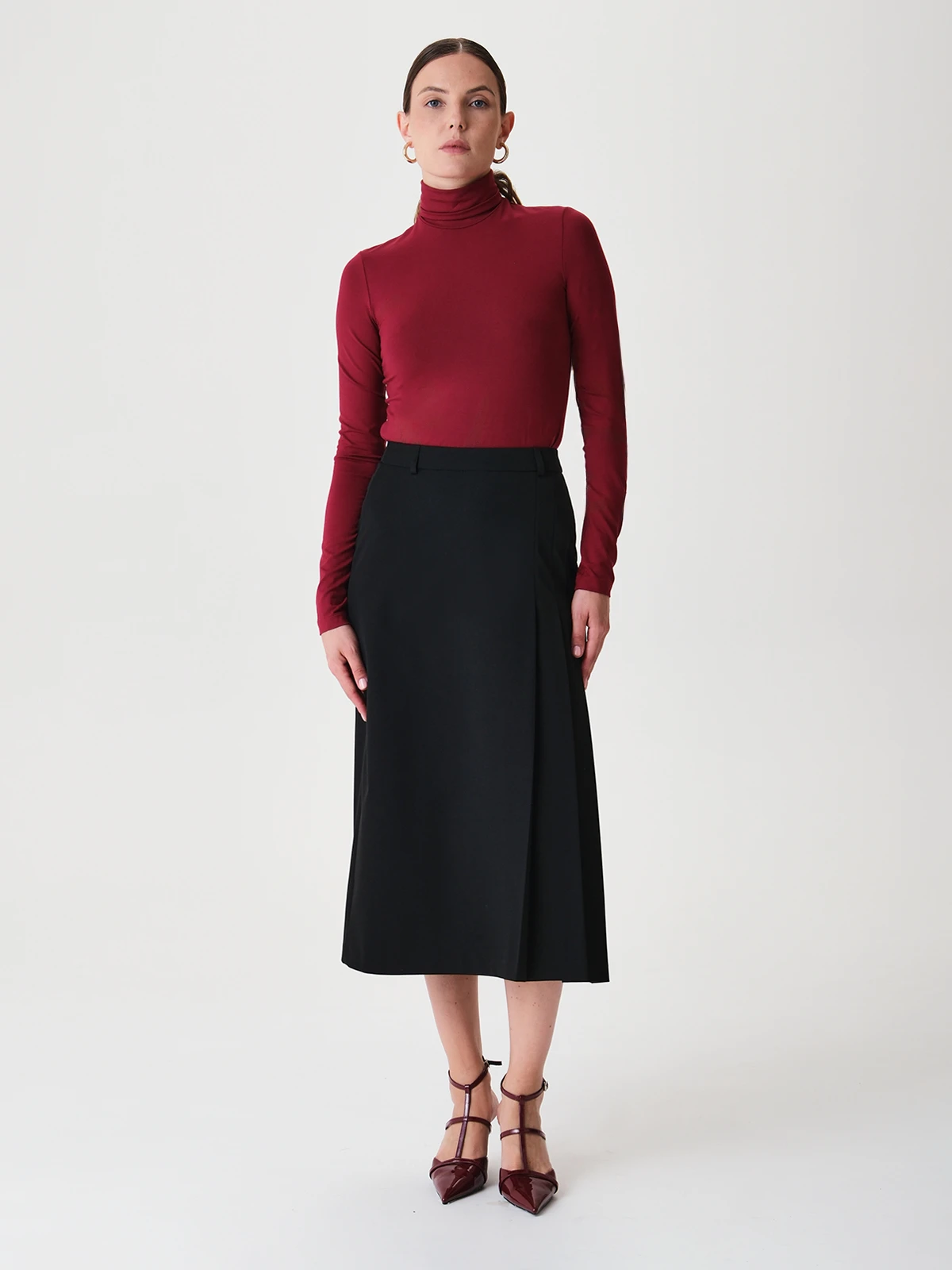 Юбка длины миди со складками